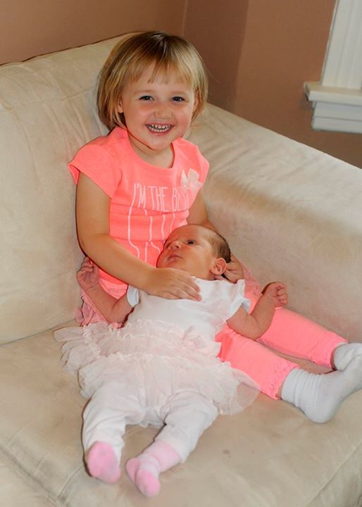 Two-year-old Michaela Brunke with baby sister Angelina Brunke