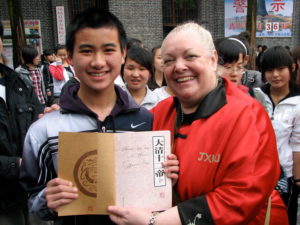 Connie English coach with a Chinese student