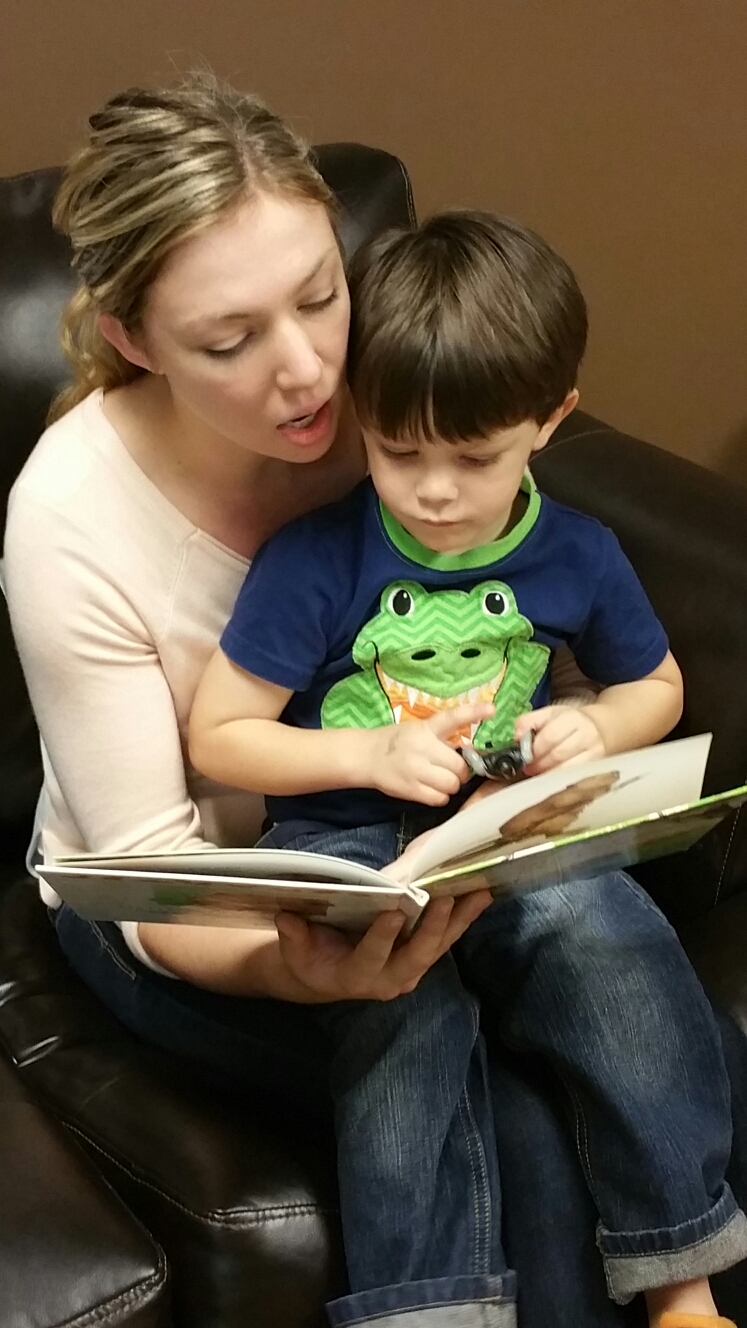 Books for Babies: woman reading to her son