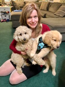 Debby Russell with a Goldendoodle and a Golden Retriever